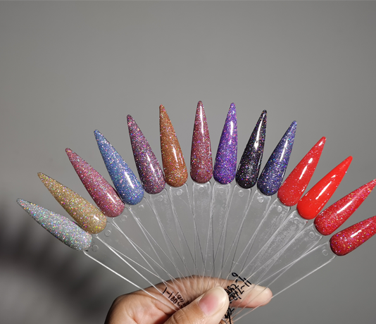 applying glitter to gel nails